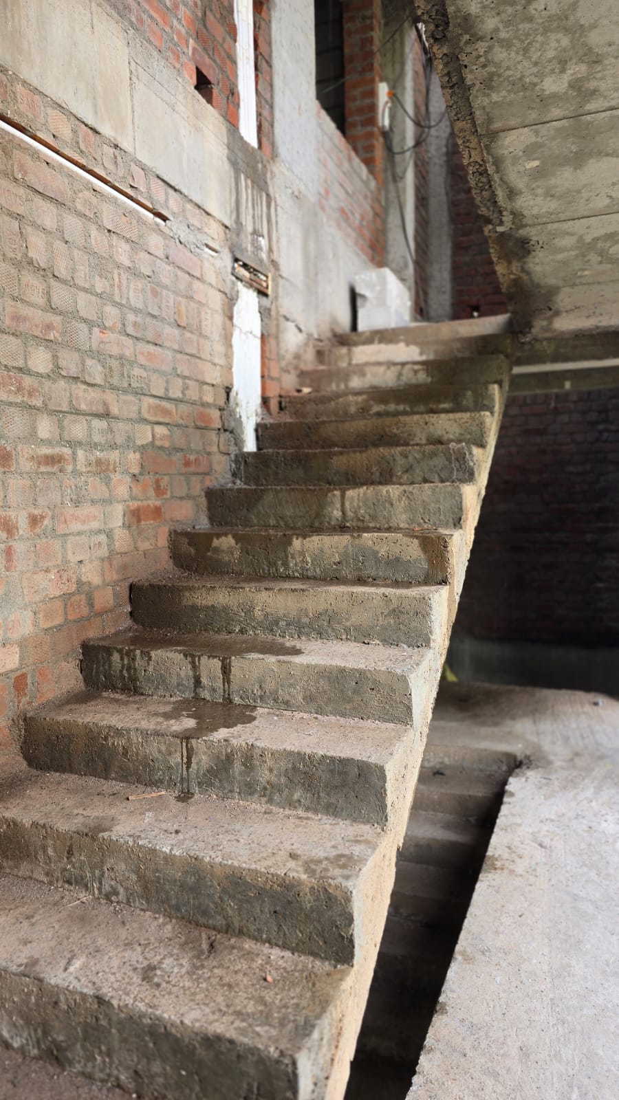 Staircase construction at the Tirunelveli residential flats site